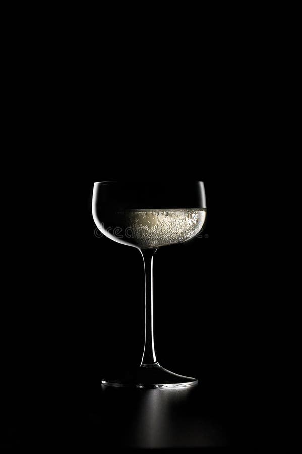 Glass of champagne stock photo. Image of black, beverage 14332782