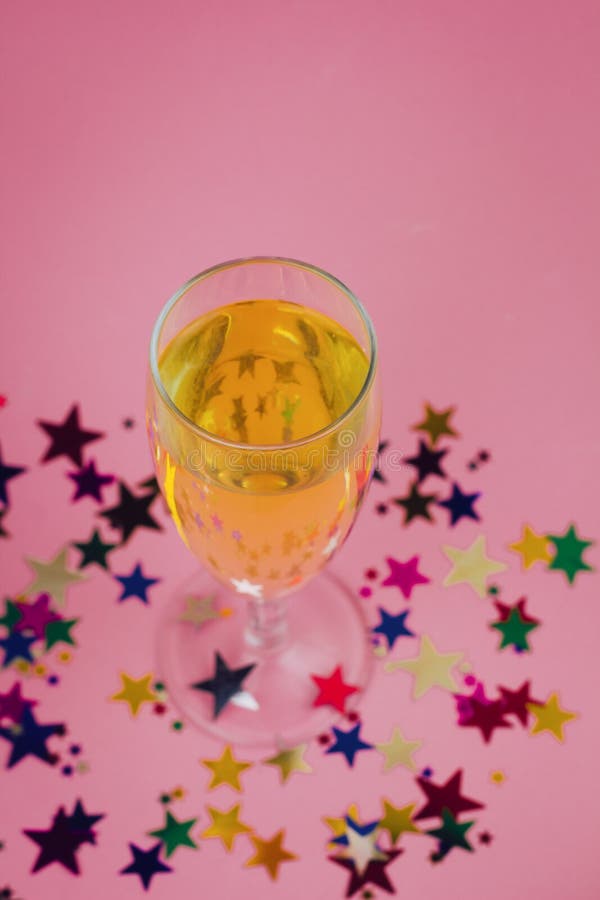 Glass Of Champagne On A Pink Background Stock Image - Image of backdrop