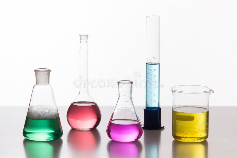 Glass in a chemical laboratory filled with colored liquid during