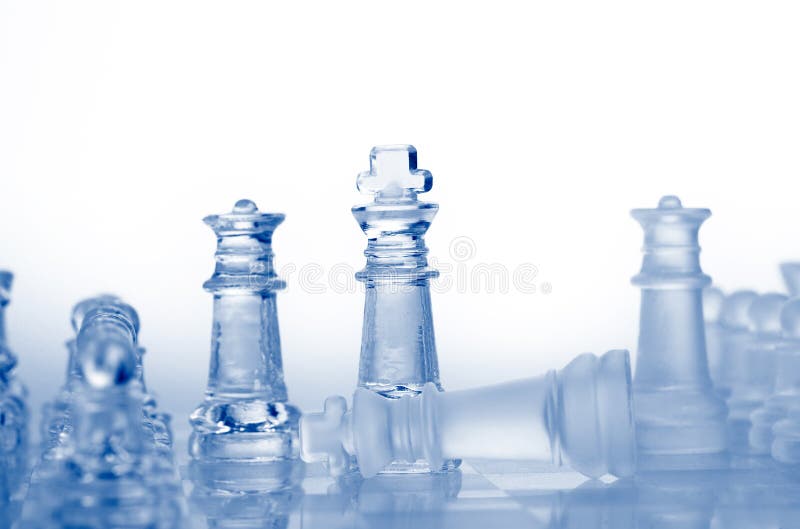 Glass chess pieces with blue light