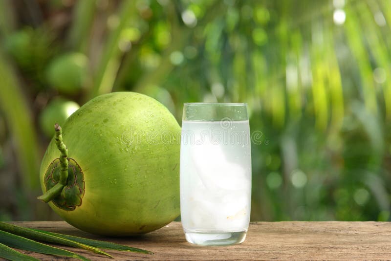 Glass of coconut juice stock photo. Image of droplet 227123606