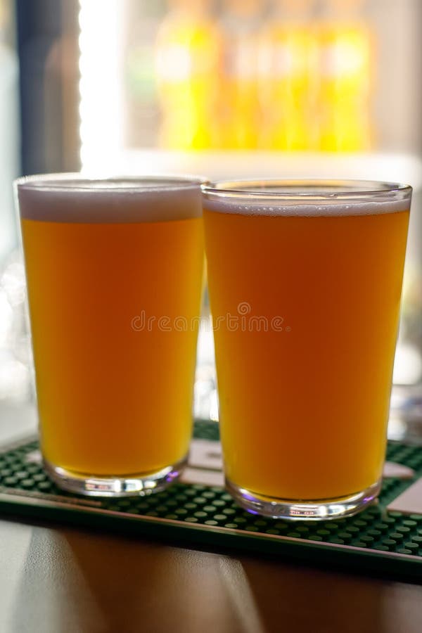 A Glass of Cold Beer at Bar Counter. Stock Image Image of alcohol