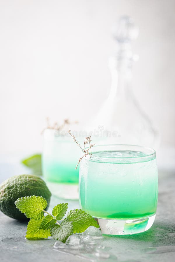 Glass of cold mint drink stock image. Image of lime 178826061