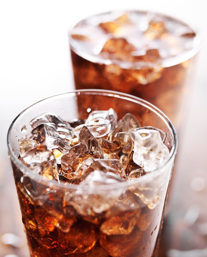 Glass cup of cola soda with ice