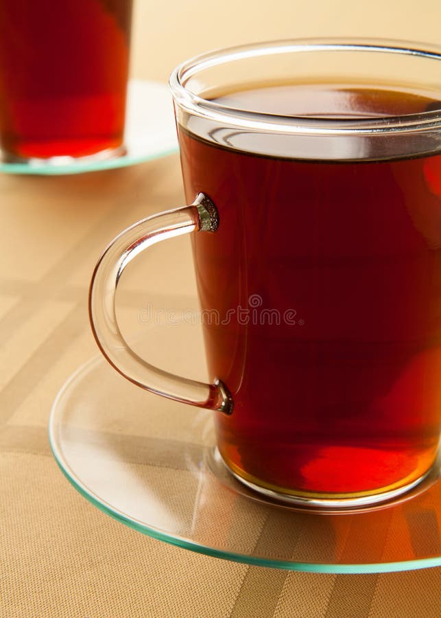Glass Cup with fresh tea stock image. Image of table 38978893