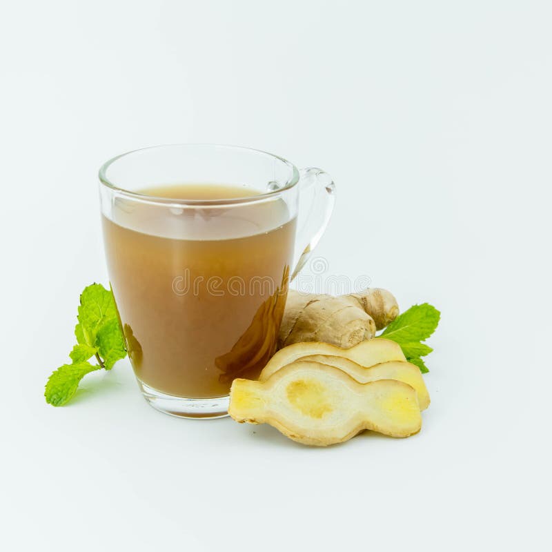 Glass Cup of Hot Ginger Tea with Ginger Rhizome on White Background