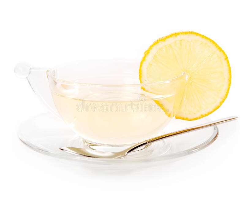 Glass cup of tea with lemon