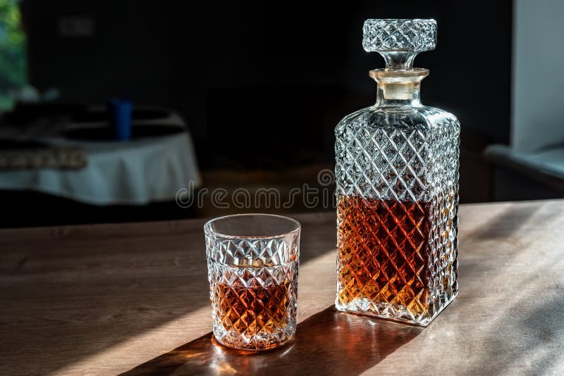 A Glass and Decanter of Whiskey on the Table Stock Photo Image of