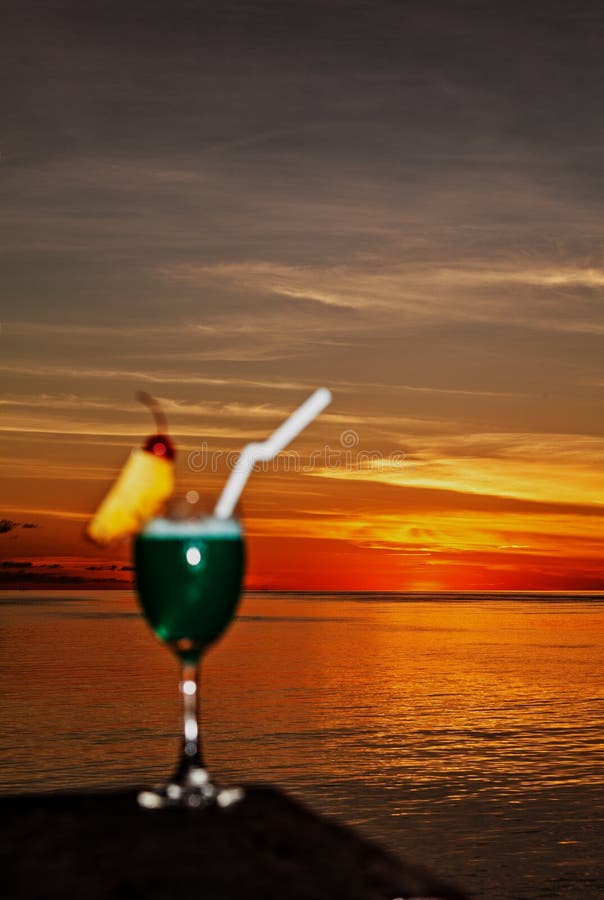 Glass of Drink is on a Beach Table Stock Image Image of beach, drop