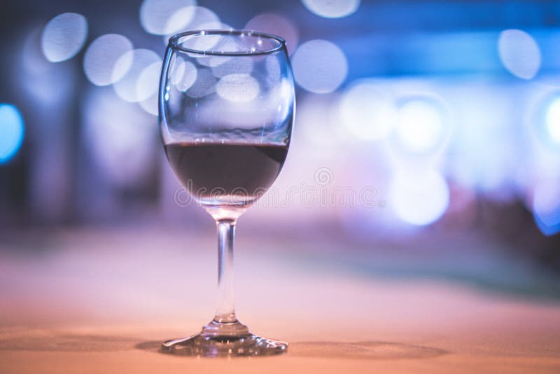 Glass of Expensive Wine at a Luxurious Dinner. Stock Photo Image of