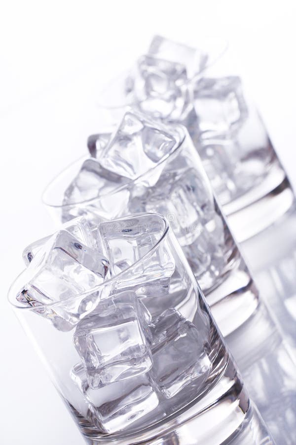 Glass filled with ice cubes