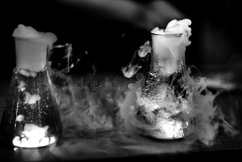 Glass flasks with chemical reaction