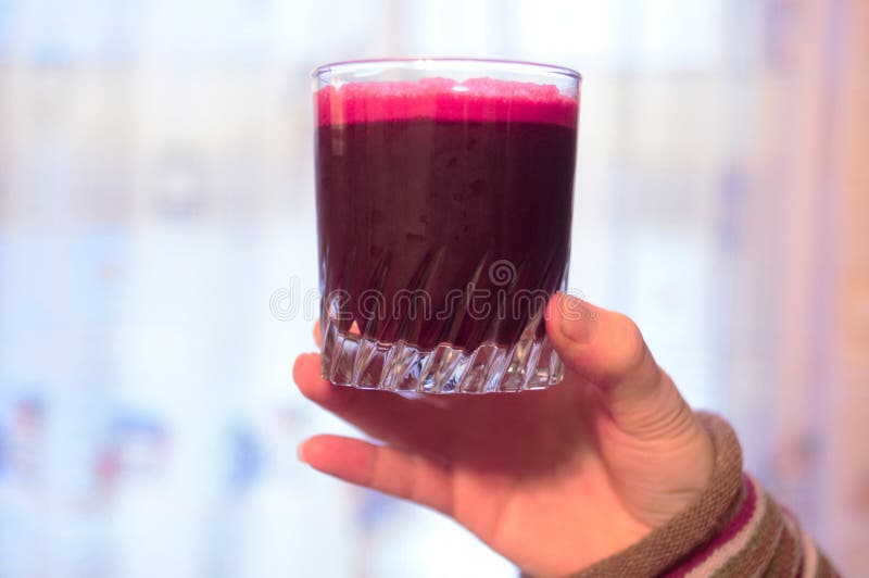 Glass of Fresh Squeezed Raw Beet Juice stock image