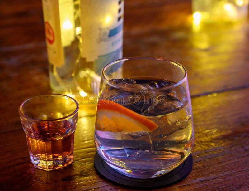 Glass of Gin with Tonic Water, Orange and Ice Stock Photo Image of