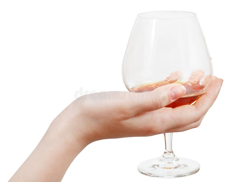 Glass Goblet With Brandy In Hand Isolated Stock Photo Image of drink