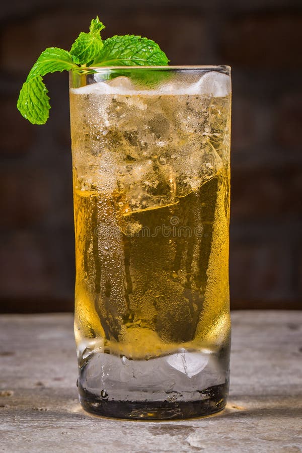 Glass of Golden Iced Tea with Mint Leaf Stock Photo Image of leaf