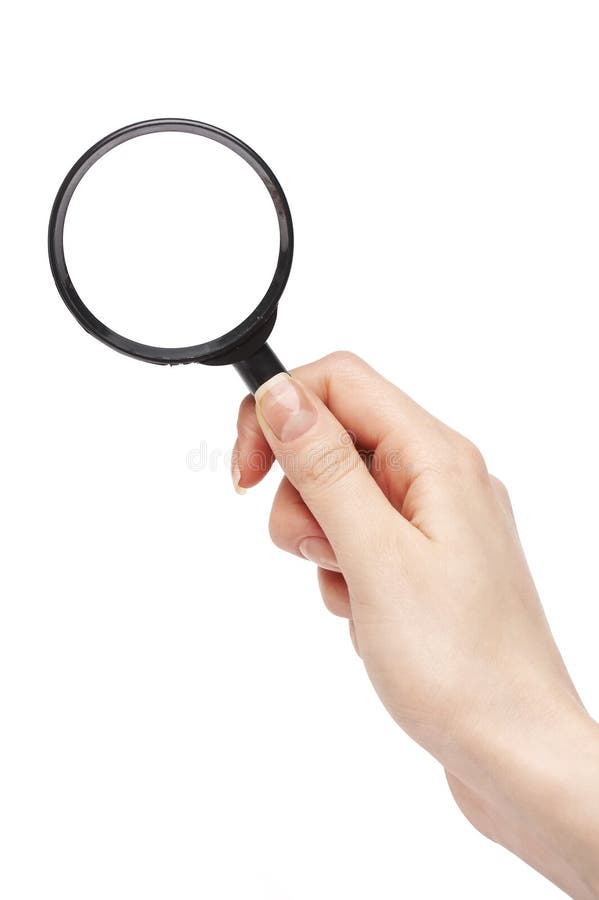 Hand of a woman holding magnifying glass. Hand of a woman holding magnifying glass
