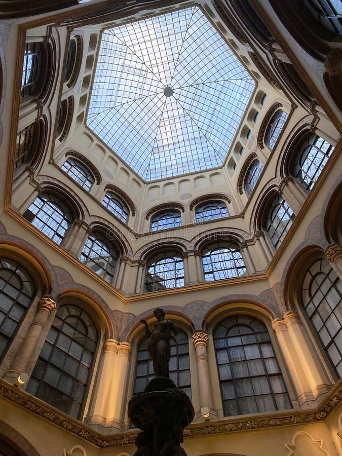 Glass, Hexagon Ceiling of a Historical Building and a Sculpture, Low Angle, Vertical Editorial
