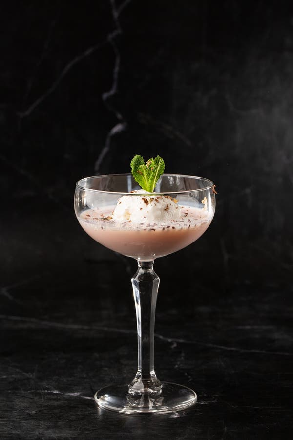 Glass of Ice Cold Baileys Cocktail Served in a Coupe Glass, Decorated