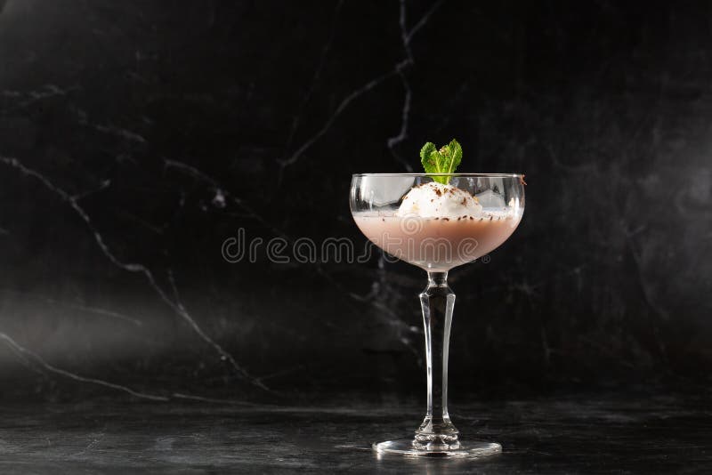 Glass of Ice Cold Baileys Cocktail Served in a Coupe Glass, Decorated