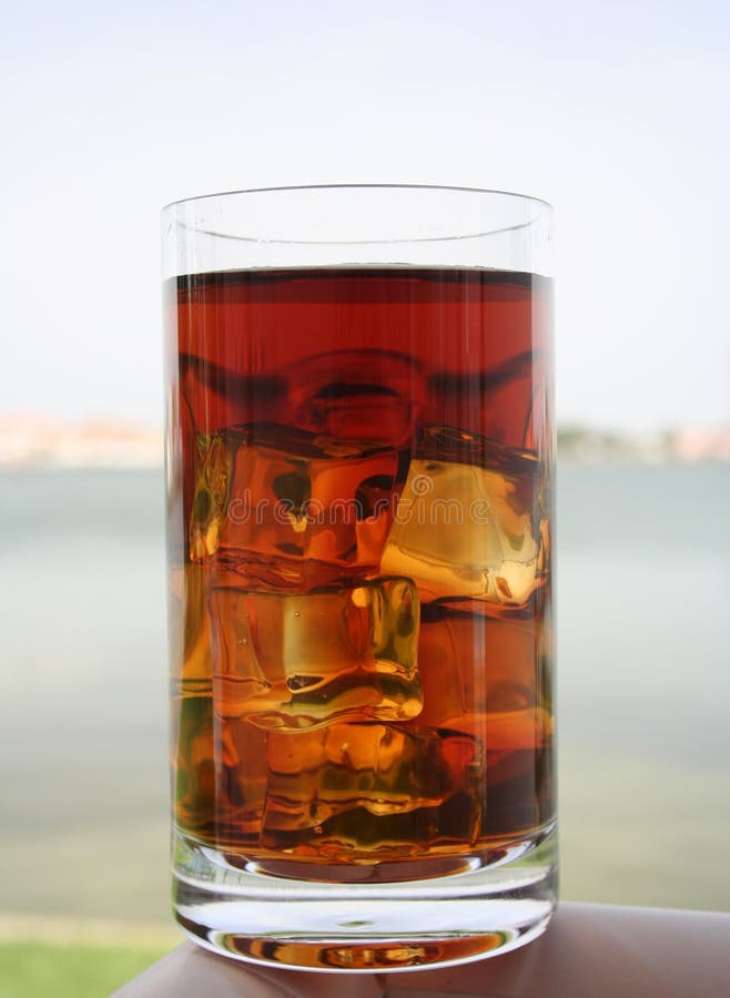 Glass of iced tea stock image. Image of cube, party, cool 1047527