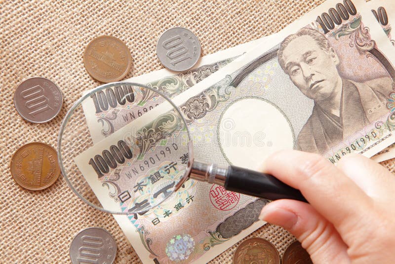 Japan Yen Money with magnifying glass for finance concept. Japan Yen Money with magnifying glass for finance concept