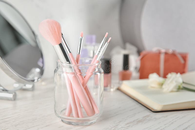 Glass Jar with Cosmetic Brushes on Table Stock Photo Image of visage