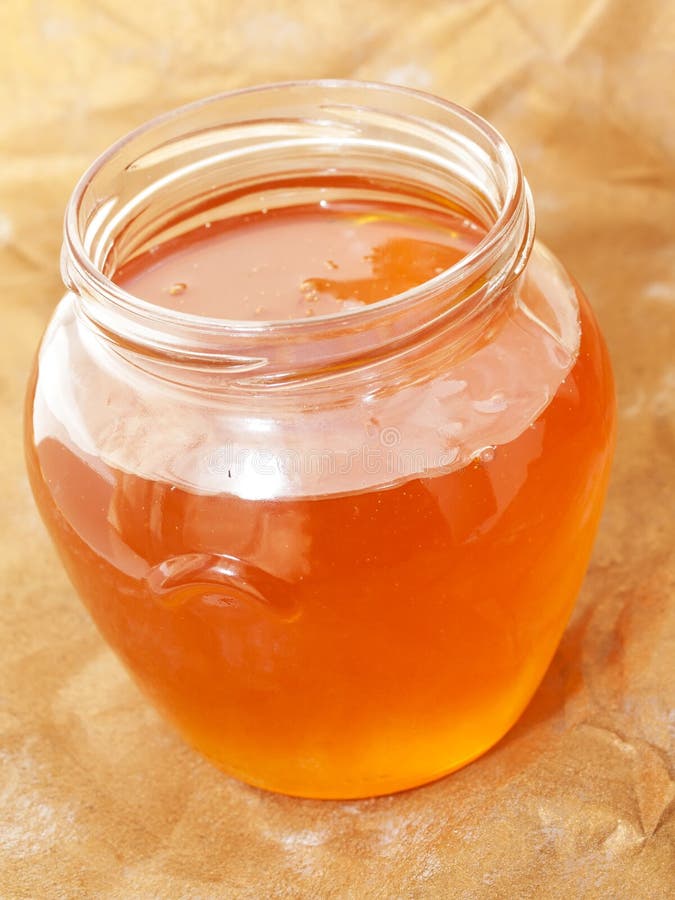 Glass jar of fresh honey stock photo. Image of flower 34010414