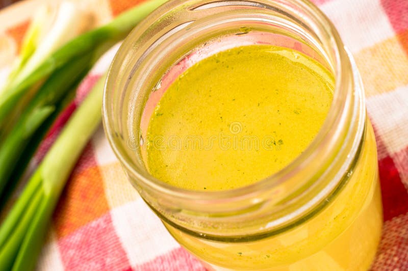 Glass jar with homemade bouillon stock photos Glass jar with homemade bouillon stock photos