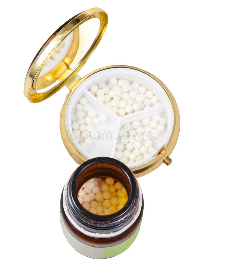 Glass brown jar and mirror pill box with homeopathy sugar balls in isolated on white background. Glass brown jar and mirror pill box with homeopathy sugar balls in isolated on white background