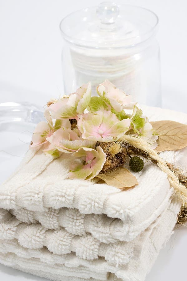 Glass jar and towels