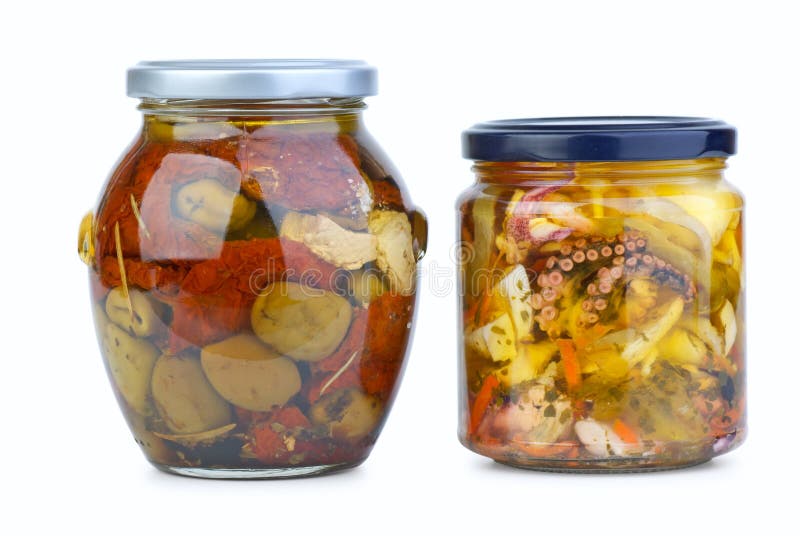 Glass jars with olives and seafood