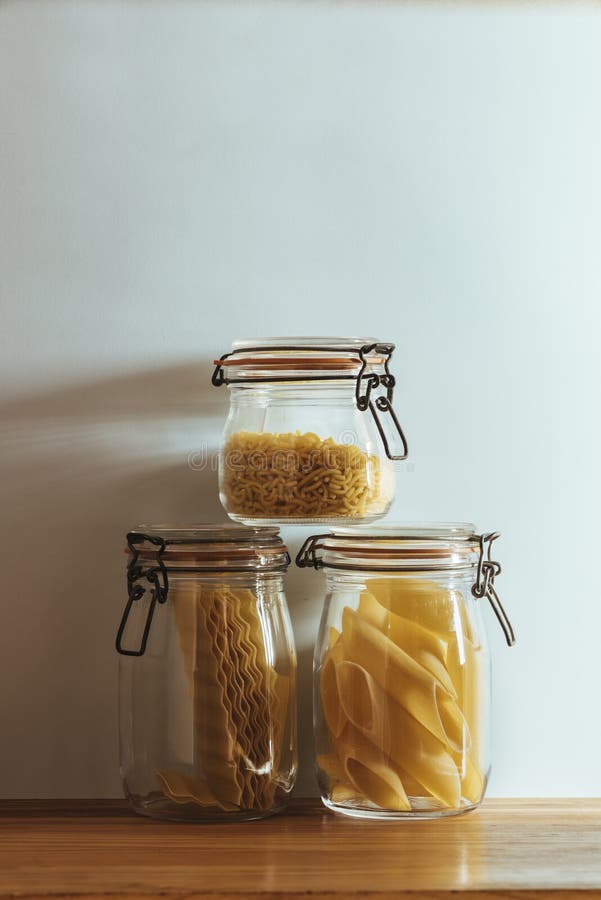 Glass Jars with Raw Pasta, on the Kitchen Shelf Stock Photo Image of