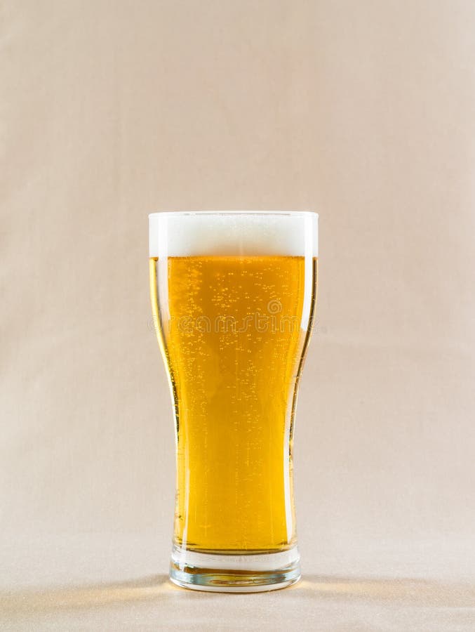 Glass of light beer stock image. Image of cold, lager 106317349