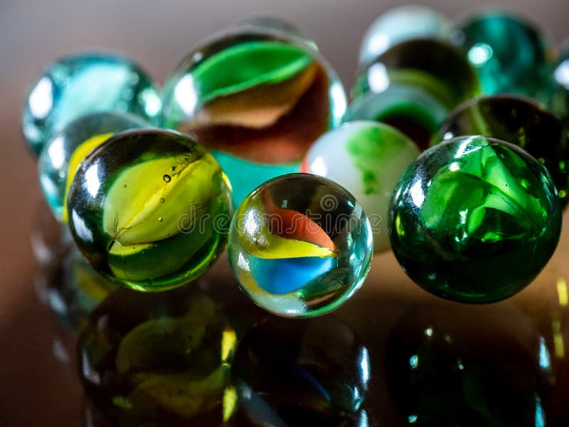 Colored Clear Glass Marbles. Stock Image Image of popular, scattered