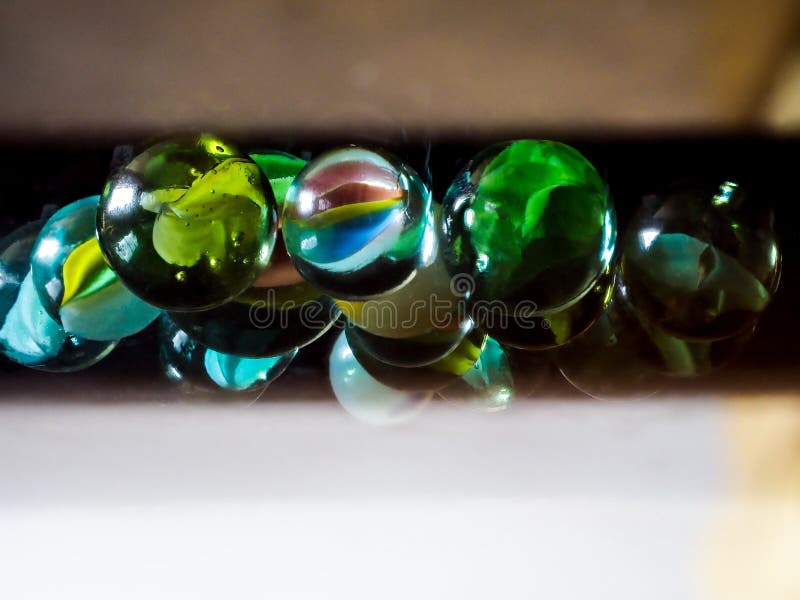 Colored Clear Glass Marbles Stock Photo Image of yellow, vessel 182650814