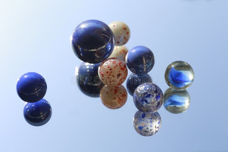 Marbles on Mirror stock photo. Image of macro, detail, closeup 353880