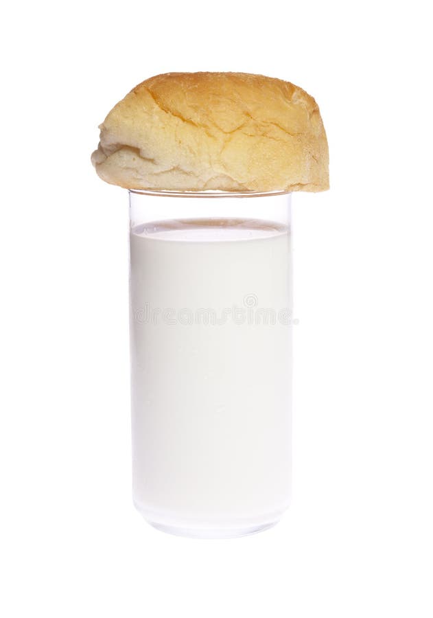 Glass of milk with bread stock photo