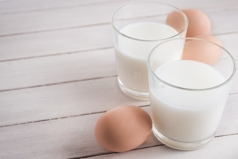 Glass of milk and eggs stock image. Image of glass, blue 59581053