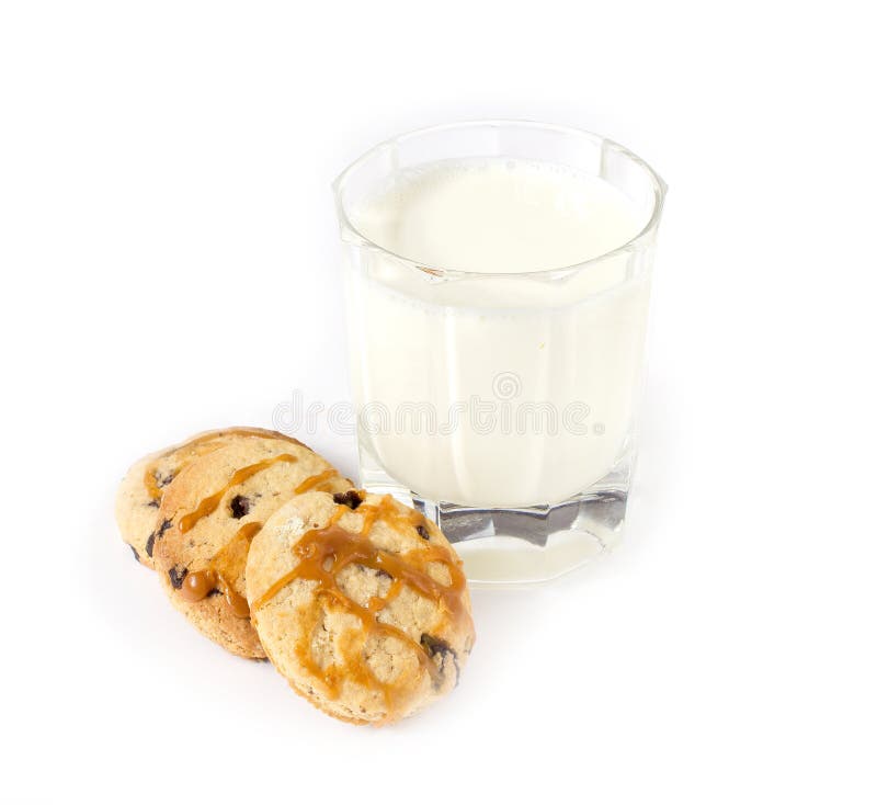 Glass of milk and oatmeal cookies with caramel