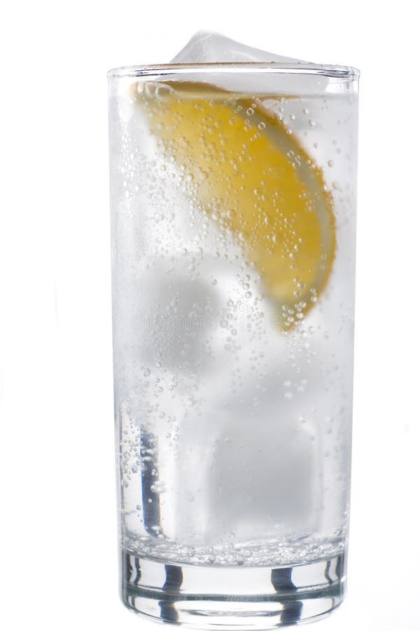 Glass of mineral water with lemon stock image