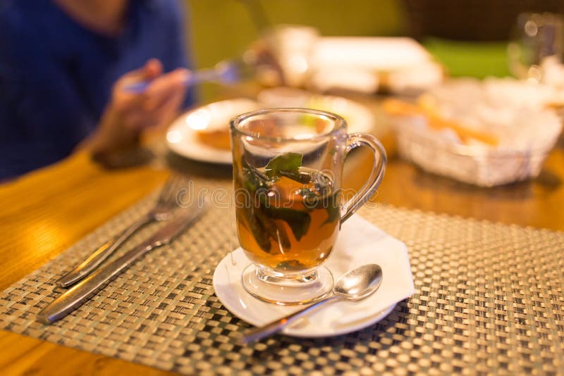 A Glass of Mint Tea in a Restaurant Stock Image Image of saucer, freshness 89152317