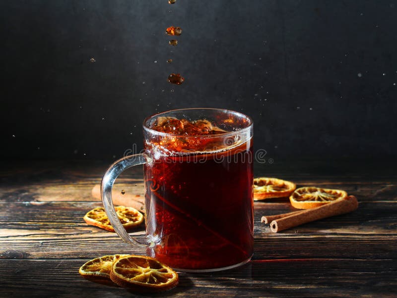 A Glass Mug with Pouring Black Tea Stock Photo - Image of pour, aroma ...