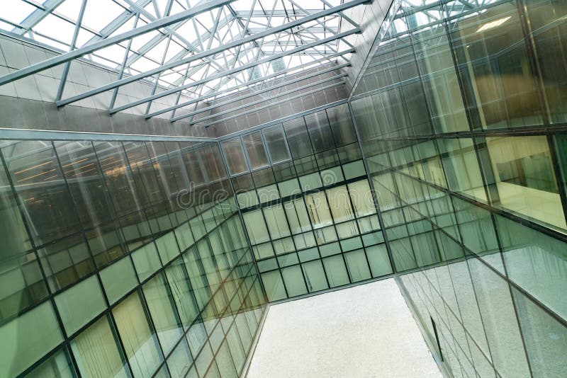 Glass office room with panoramic windows. Unused, free space, prepared for meditative garden. Modern business center stock photography