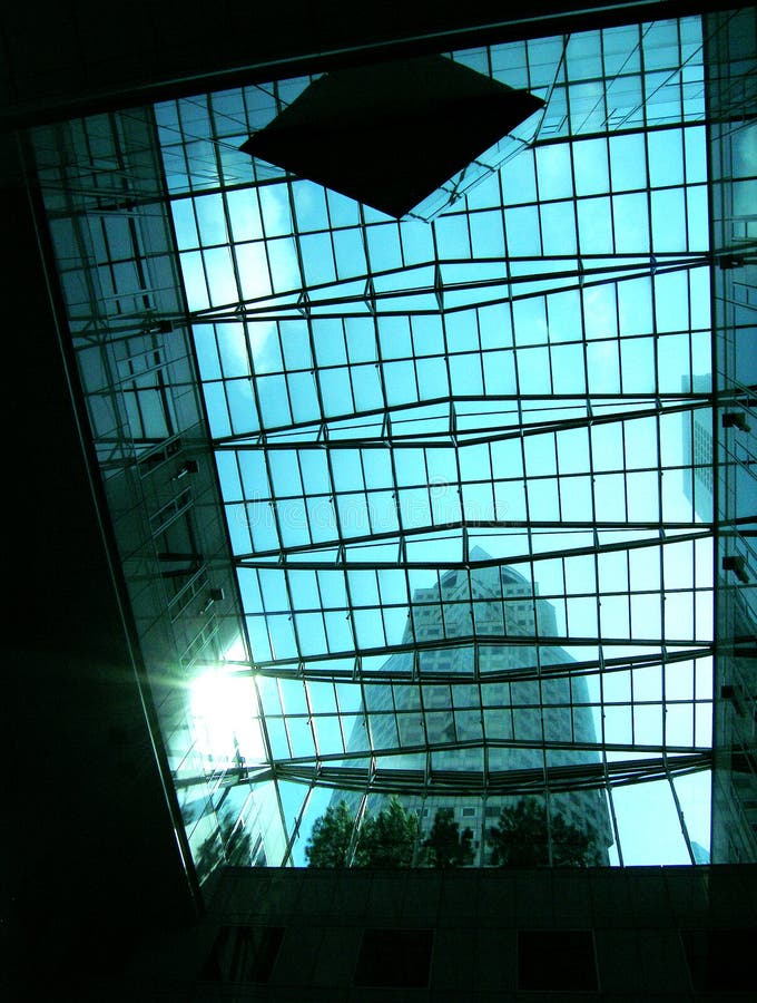 Glass of office tower building & sunburst