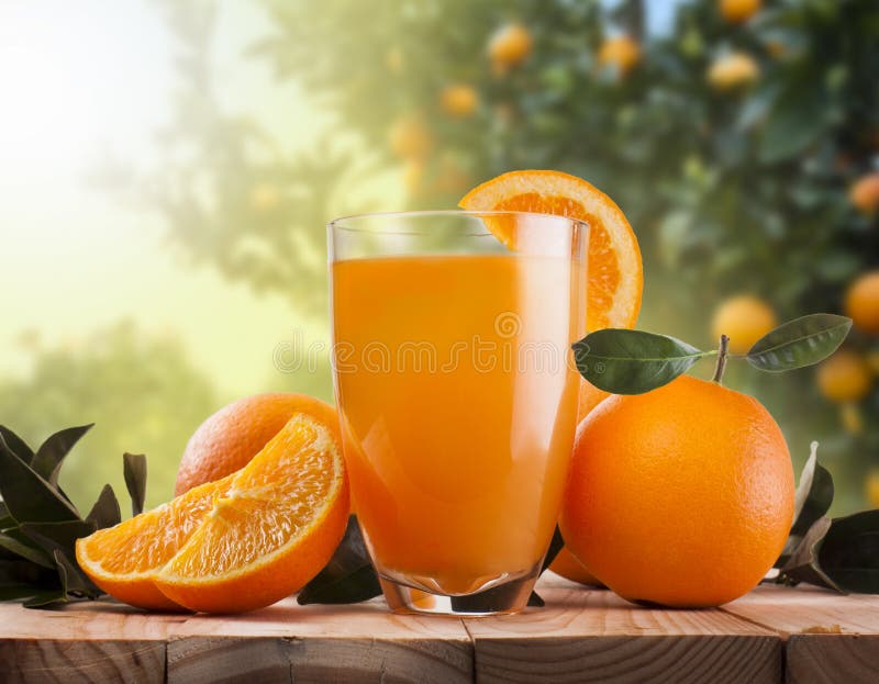 Glass of orange juice and fruits