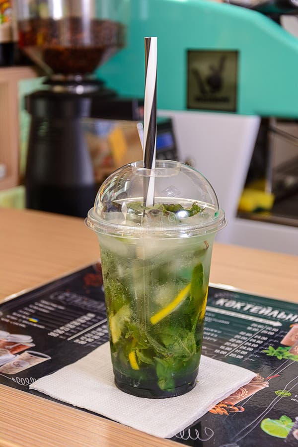 A Glass Plastic Cup with Mojito on a Table Stock Image Image of woman