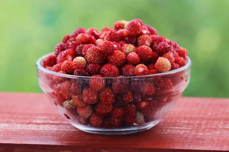 A cup with ripe strawberry