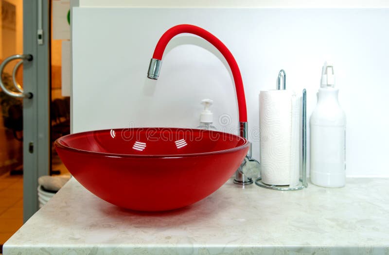 Glass Red Sink and Red Faucet in a Modern Bathroom Stock Image Image