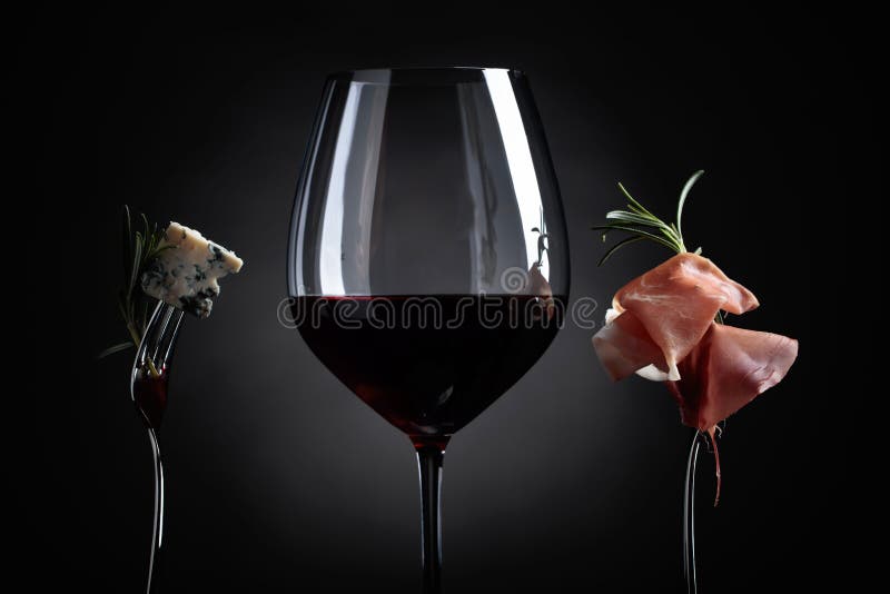 Glass of Red Wine with Blue Cheese and Prosciutto . Stock Image Image